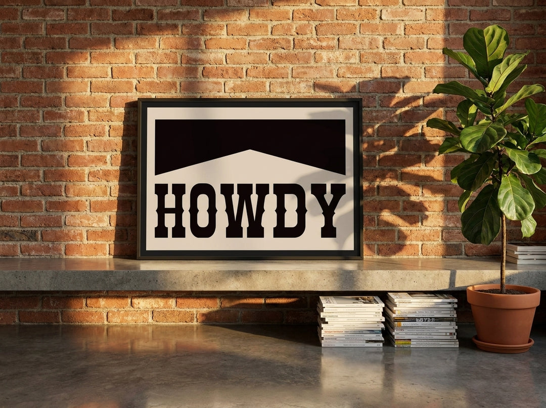 Modern wall art print standing on a kitchen bench in an industrial loft kitchen
