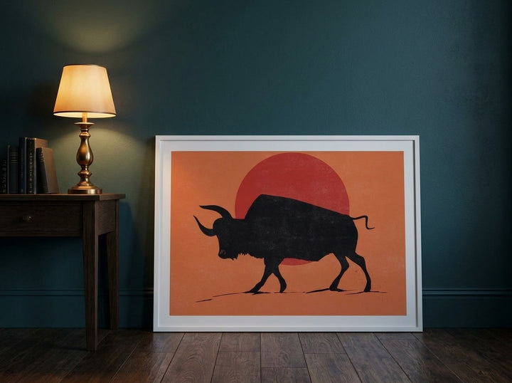 Modern wall art print leaning against the wall in a moody home office