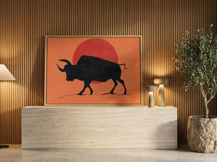 Canvas wall art with a natural timber surround standing on a console in a luxe bedroom