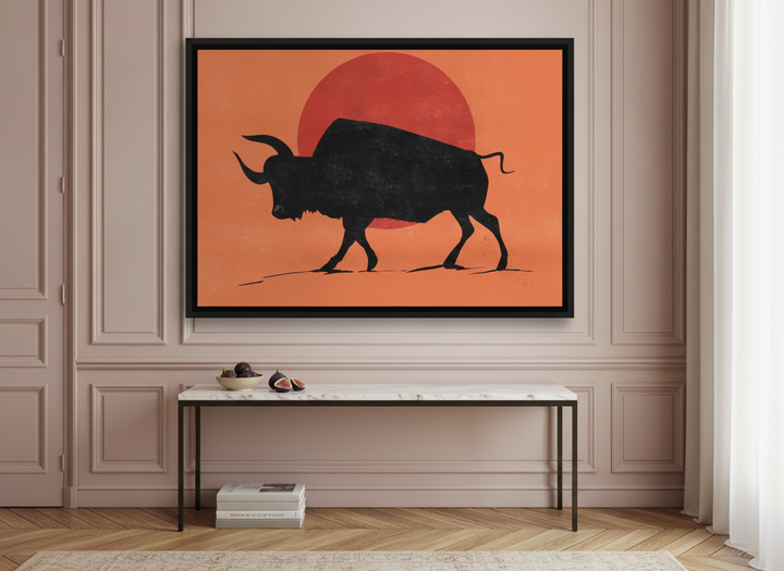 Oversized statement canvas wall art with a black surround styled on the wall in a Parisian living room