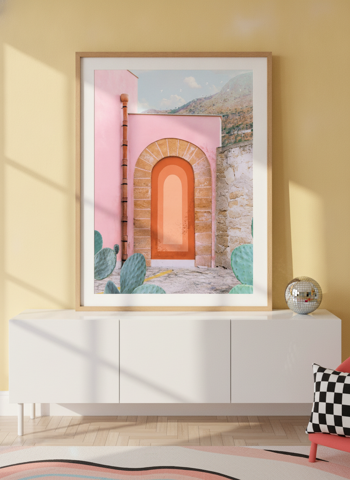 Modern wall art print standing on a sideboard in a colourful eclectic dining room