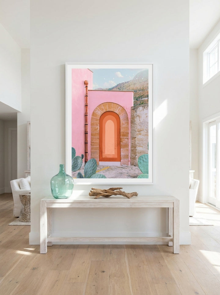 Oversized statement modern wall art print styled on the wall in a coastal living room