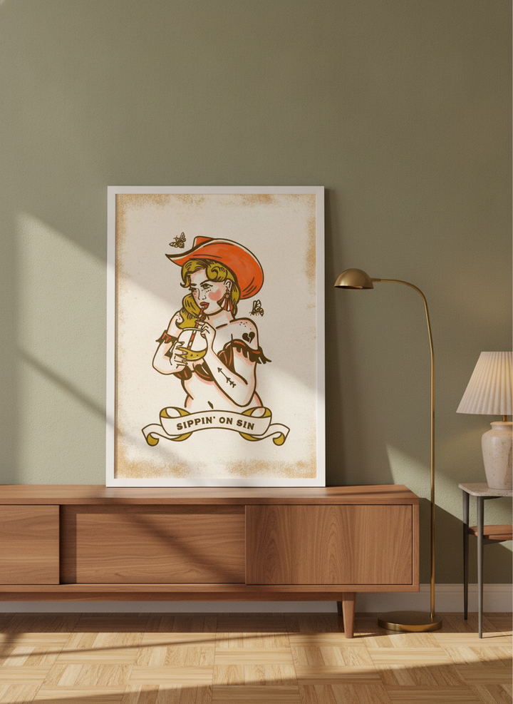 Modern wall art print standing on a sideboard in a mid-century living room