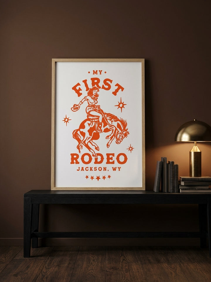 Modern wall art print standing on a console in a moody bedroom