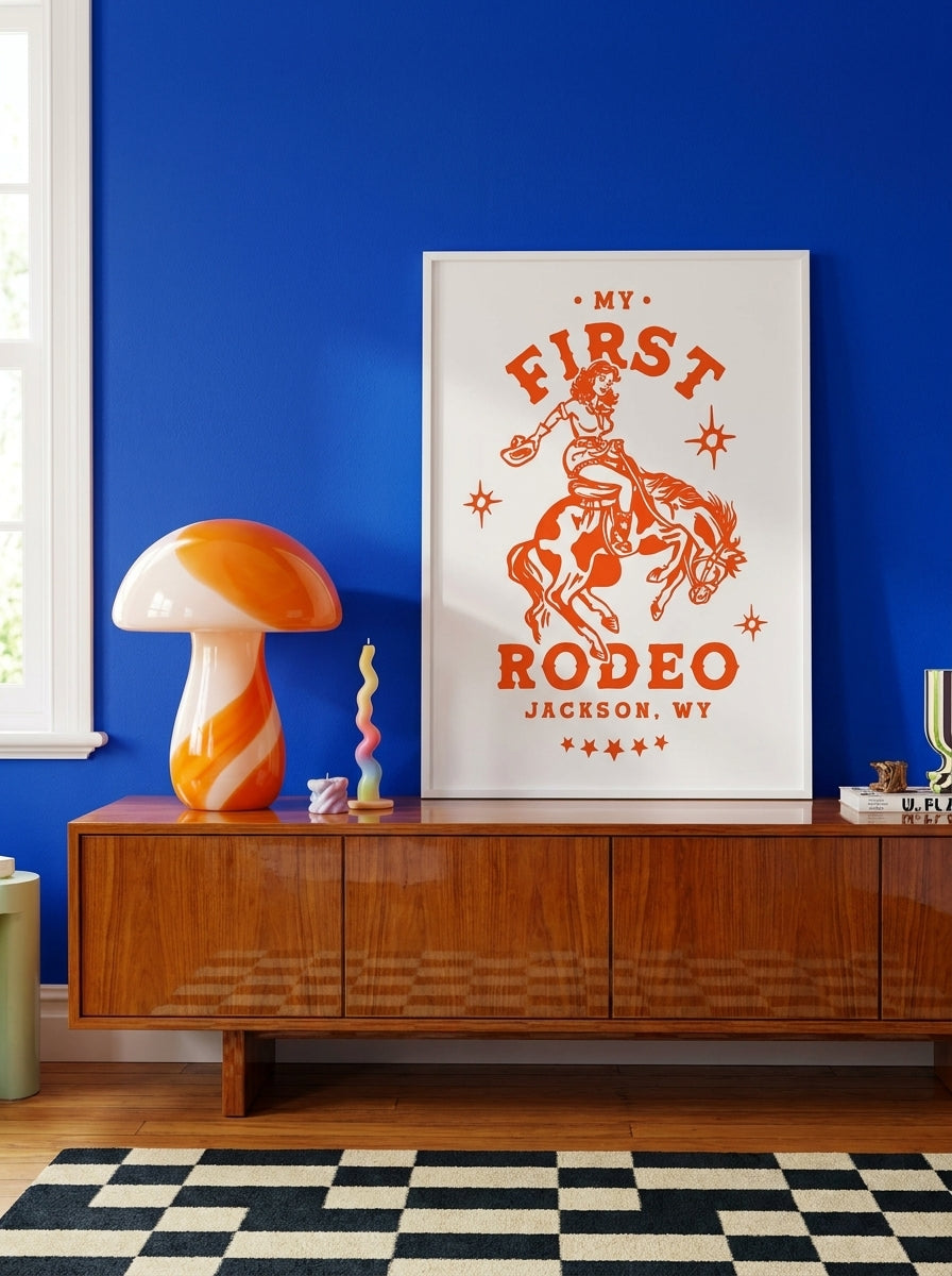 Modern wall art print standing on a sideboard in a colourful eclectic dining room