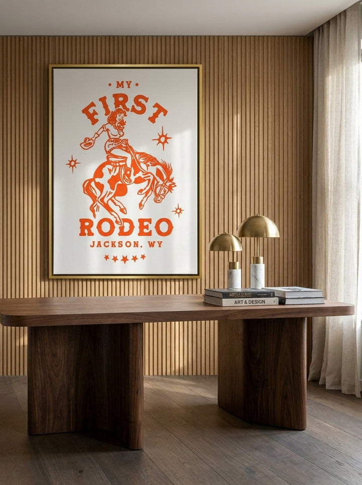 Oversized statement canvas wall art with a gold leaf surround styled on the wall in a luxe home office
