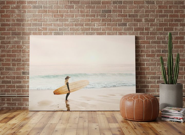 Stretched canvas wall art leaning against the wall in an industrial loft bedroom