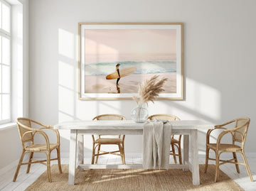 Modern wall art print styled on the wall in a coastal dining room