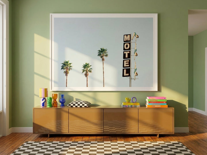 Oversized statement modern wall art print styled on the wall in a colourful eclectic living room