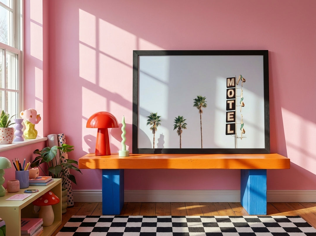 Modern wall art print standing on a side table in a colourful eclectic home office