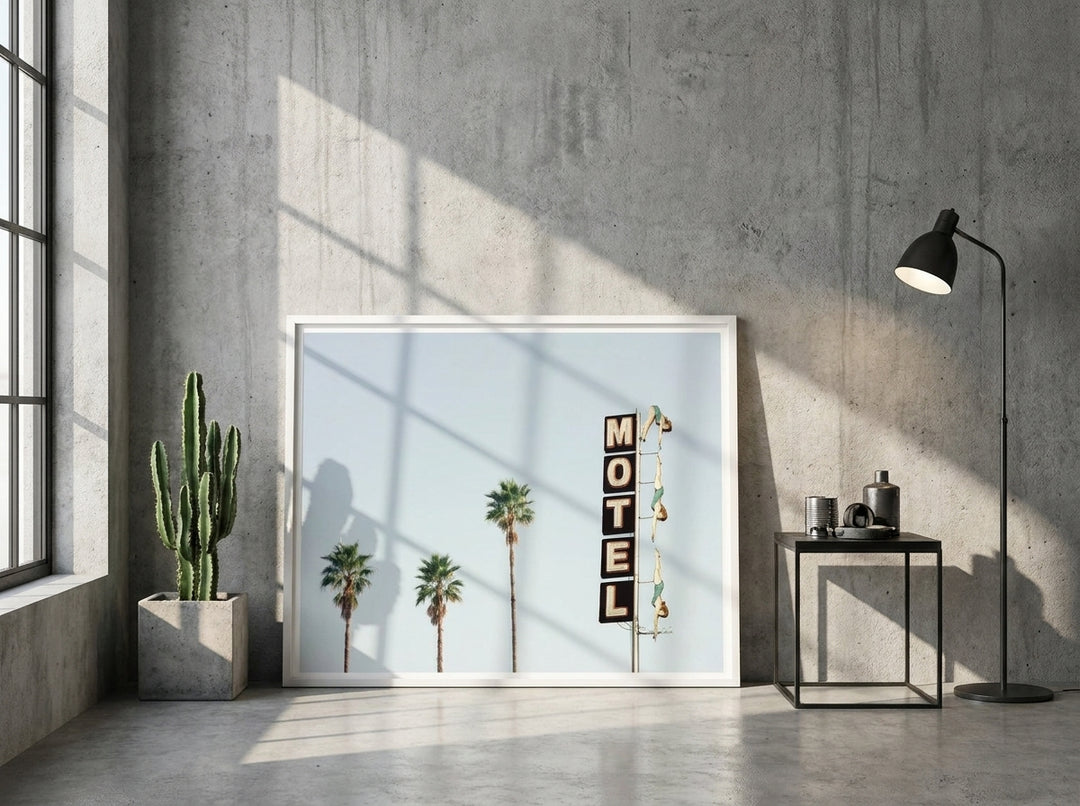 Modern wall art print leaning against the wall in an industrial loft living room