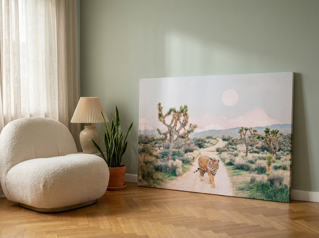 Stretched canvas wall art leaning against the wall in a mid-century home office