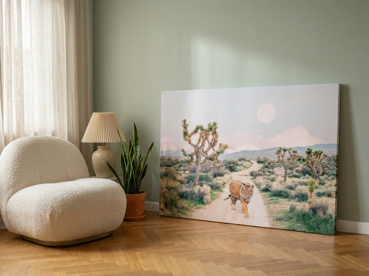 Stretched canvas wall art leaning against the wall in a mid-century home office