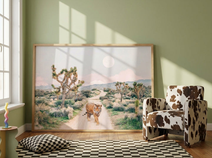 Oversized statement modern wall art print leaning against the wall in a colourful eclectic dining room