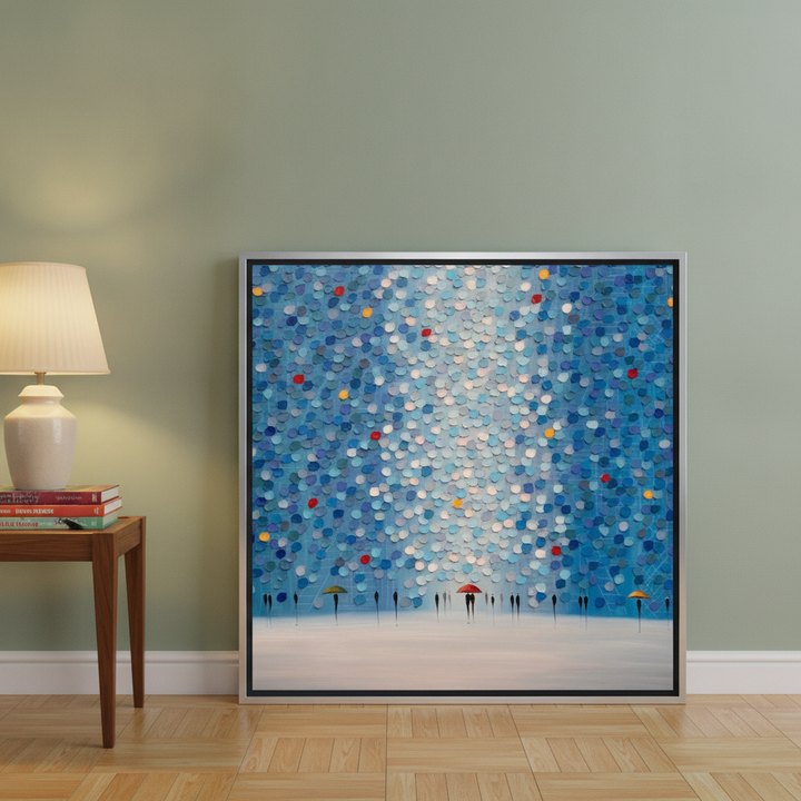 Canvas wall art with a silver leaf surround leaning against the wall in a mid-century home office