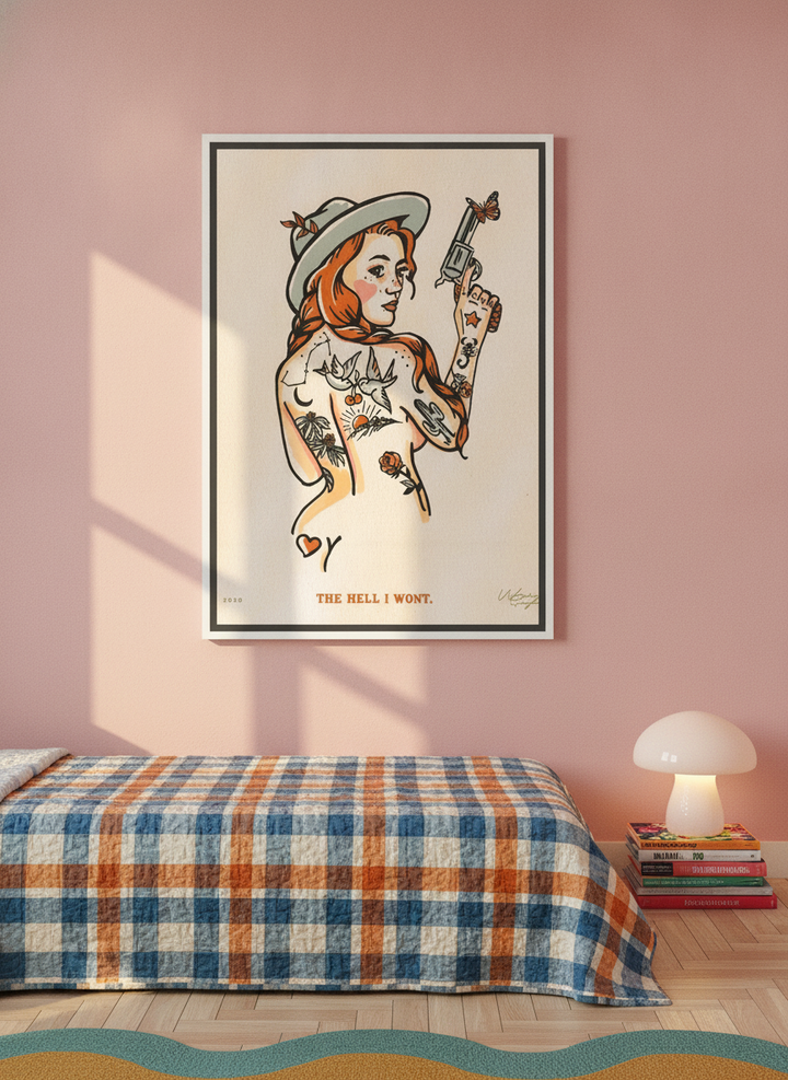 Canvas wall art with a white surround styled on the wall in a colourful eclectic bedroom