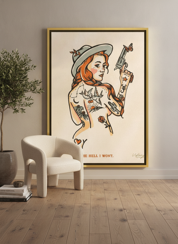Oversized statement canvas wall art with a gold leaf surround leaning against the wall in a luxe home office