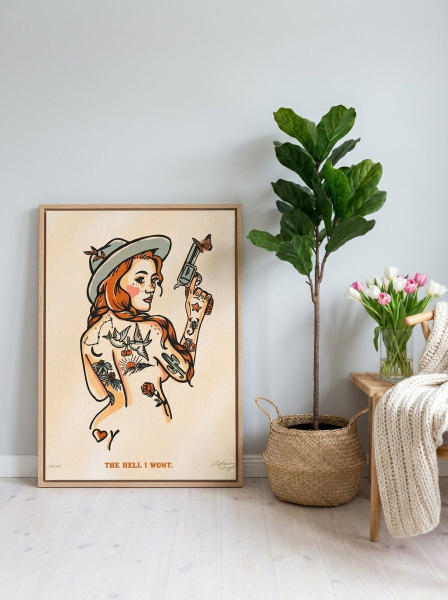 Canvas wall art with a natural timber surround leaning against the wall in a bright Scandinavian bedroom