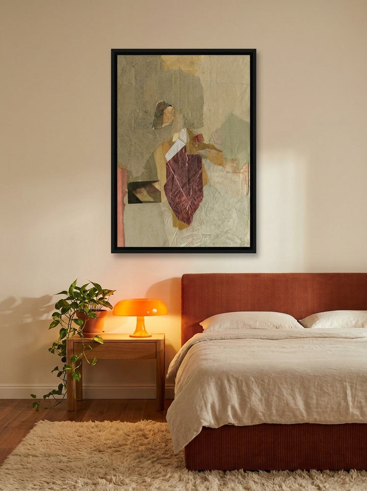 Canvas wall art with a black surround styled on the wall in a retro 70s bedroom