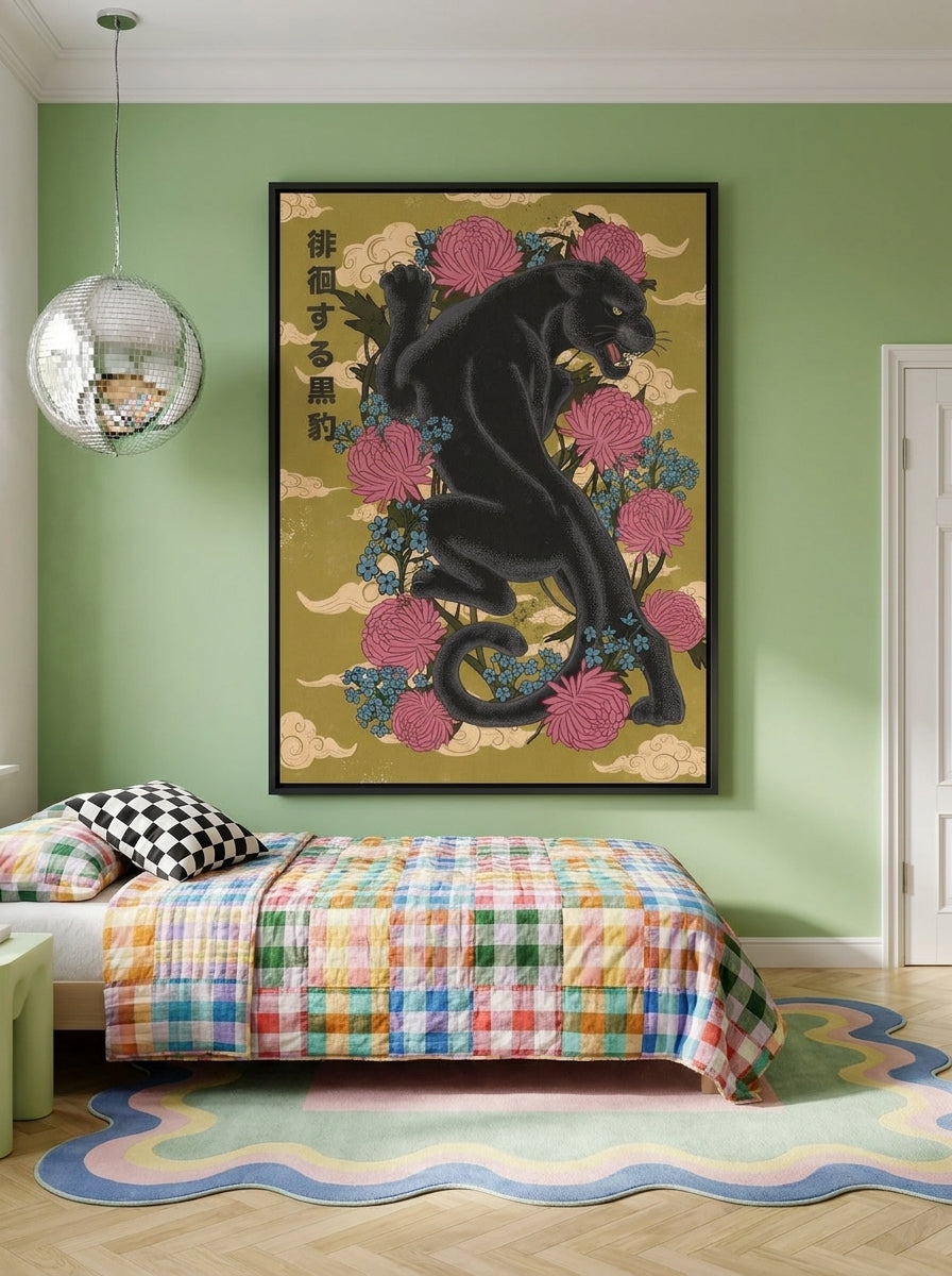 Oversized statement canvas wall art with a black surround styled on the wall in a colourful eclectic bedroom