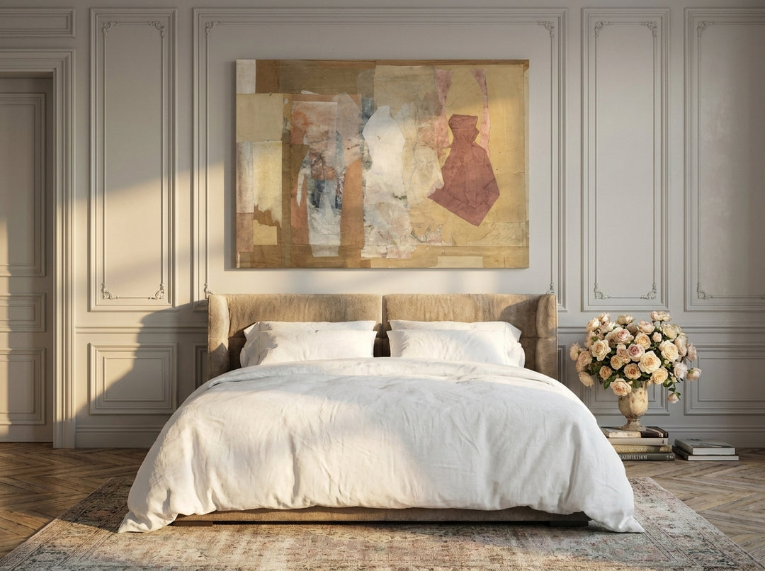 Stretched canvas wall art styled on the wall in a Parisian bedroom