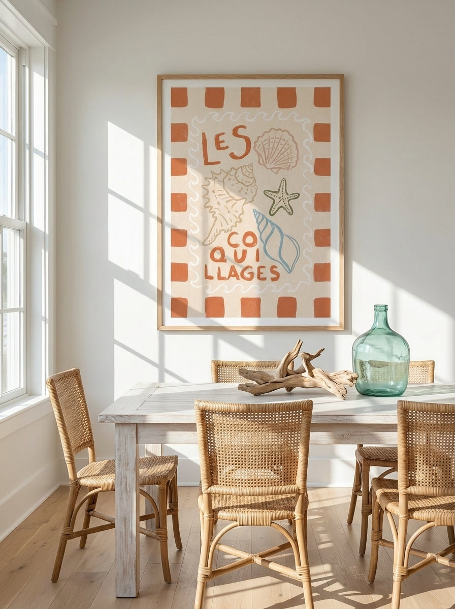 Modern wall art print styled on the wall in a coastal dining room
