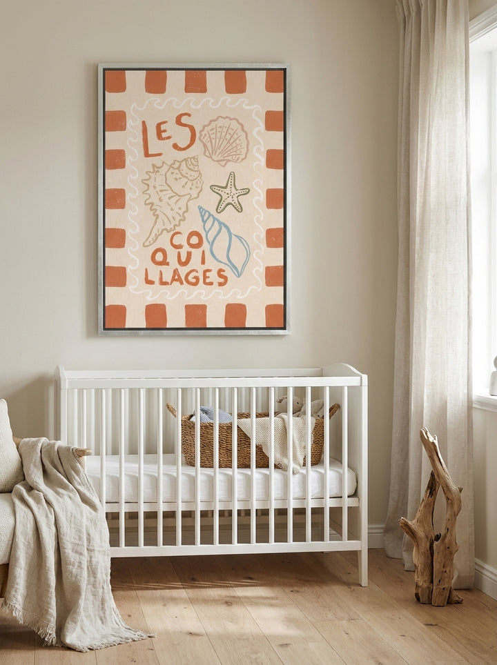 Canvas wall art with a silver leaf surround styled on the wall in a coastal nursery