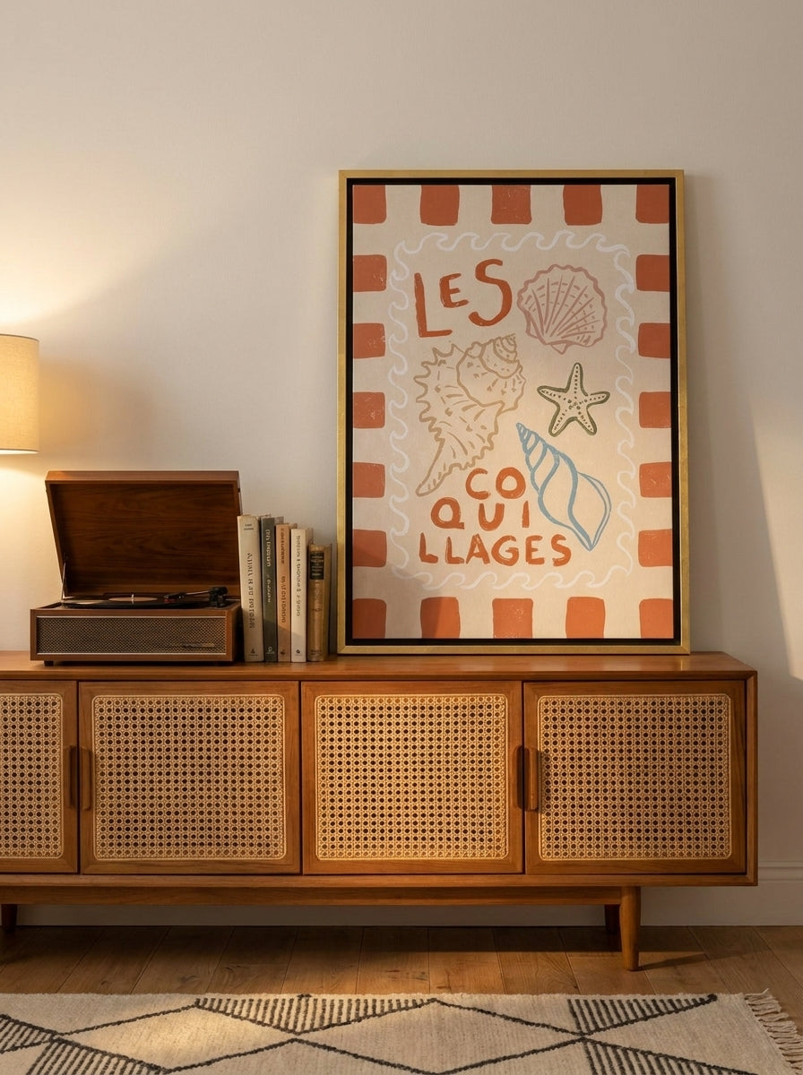 Canvas wall art with a gold leaf surround standing on a sideboard in a mid-century dining room
