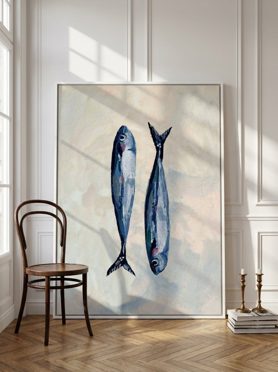 Oversized statement canvas wall art with a white surround leaning against the wall in a Parisian dining room
