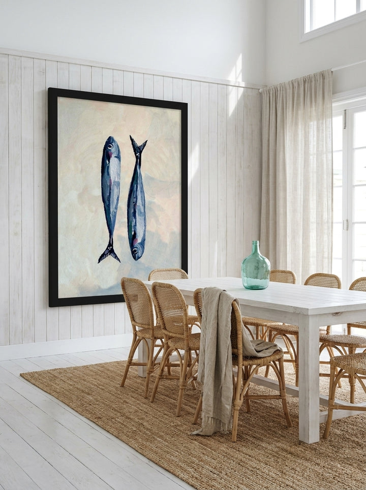 Oversized statement modern wall art print styled on the wall in a coastal dining room