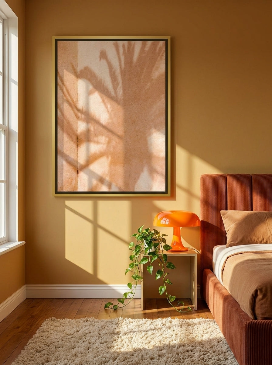Canvas wall art with a gold leaf surround styled on the wall in a retro 70s bedroom