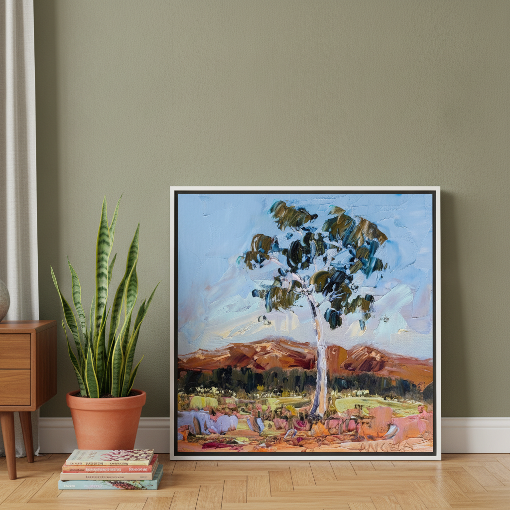 Canvas wall art with a white surround leaning against the wall in a mid-century bedroom