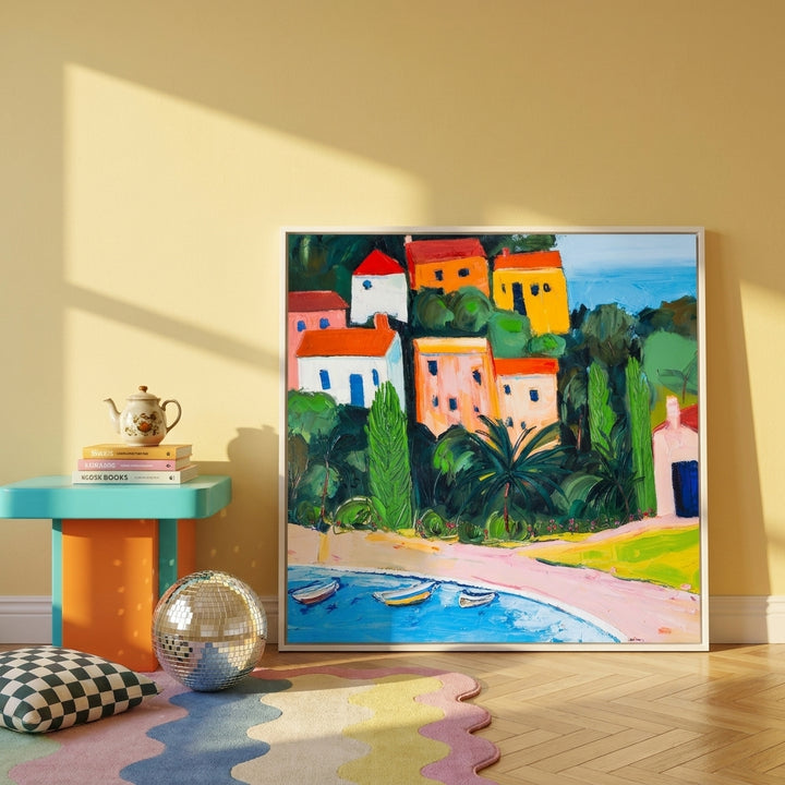 Canvas wall art with a white surround leaning against the wall in a colourful eclectic kitchen