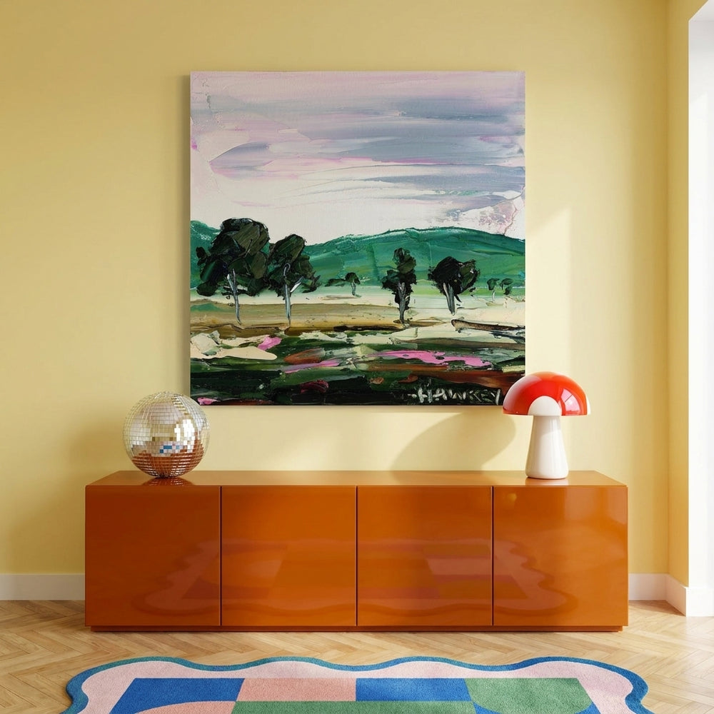 Stretched canvas wall art styled on the wall in a colourful eclectic living room