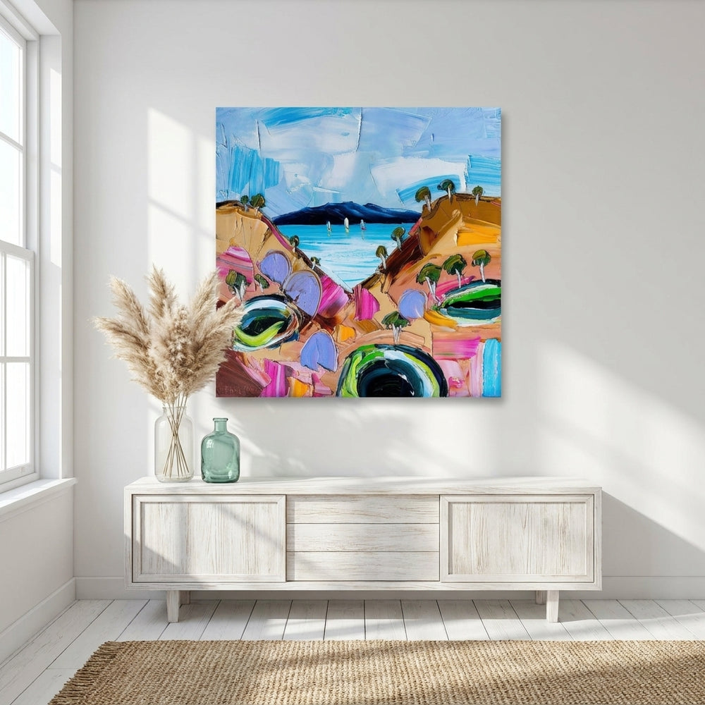 Stretched canvas wall art styled on the wall in a coastal living room