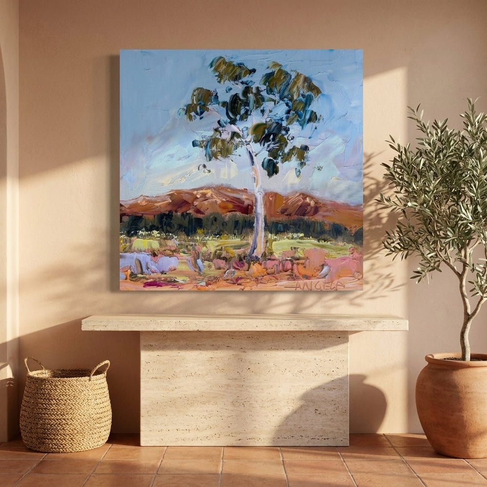 Stretched canvas wall art styled on the wall in a Mediterranean living room