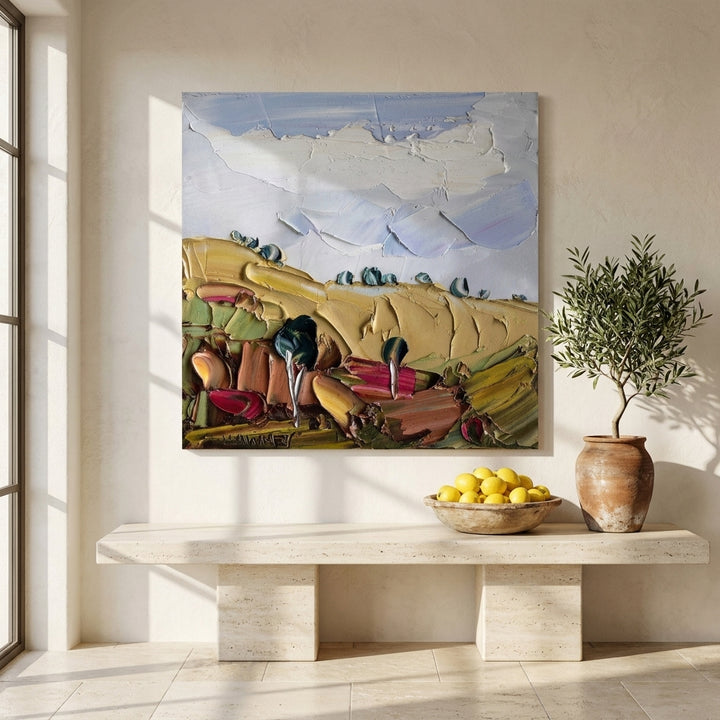 Stretched canvas wall art styled on the wall in a Mediterranean living room