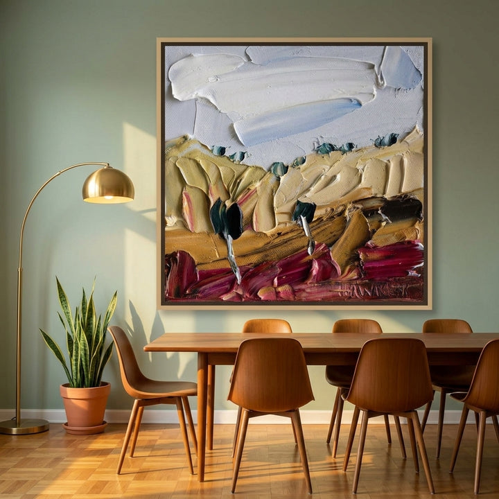 Oversized statement canvas wall art with a natural timber surround styled on the wall in a mid-century dining room