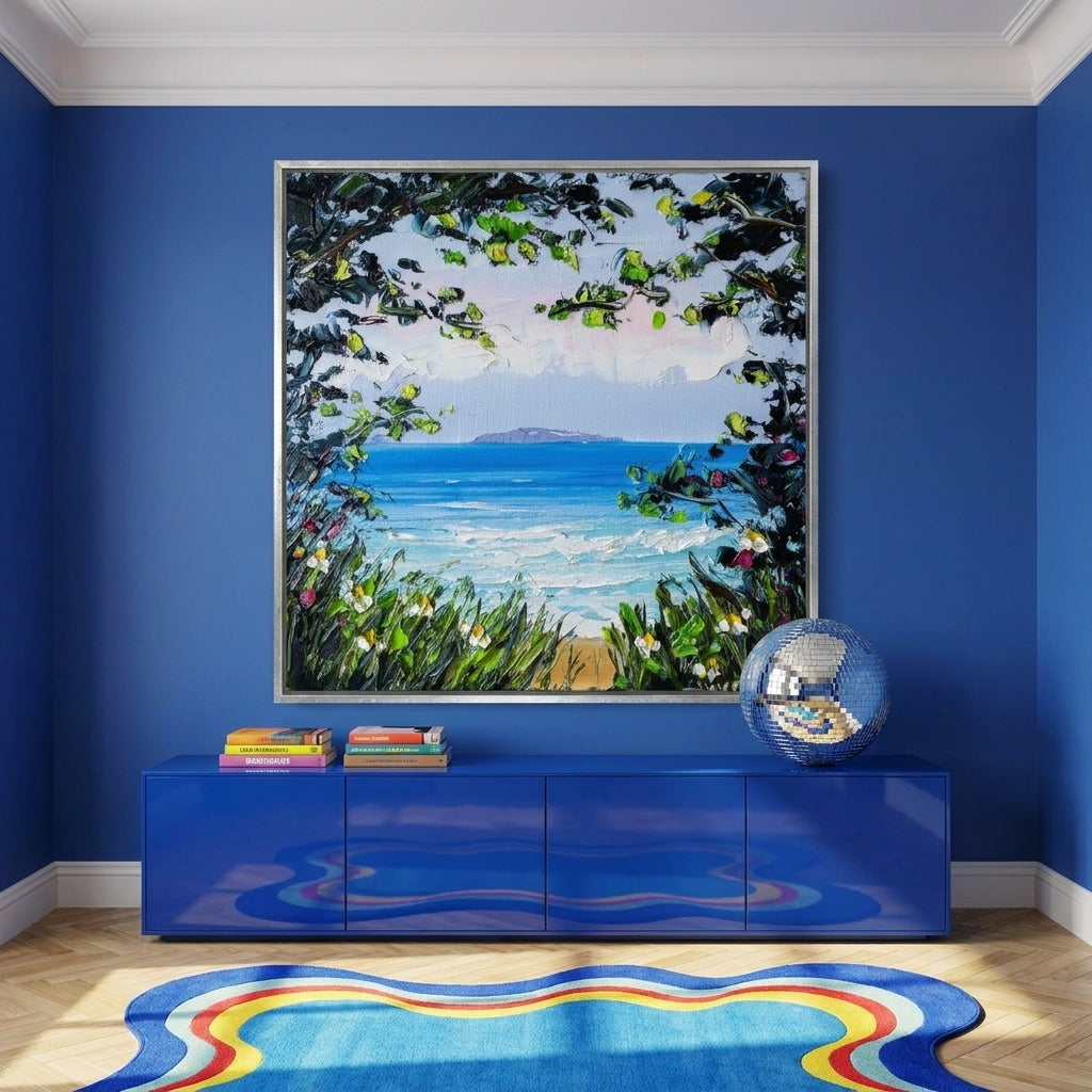 Oversized statement canvas wall art with a silver leaf surround styled on the wall in a colourful eclectic living room