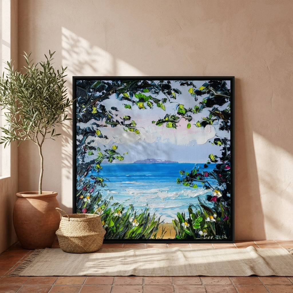 Oversized statement canvas wall art with a black surround leaning against the wall in a Mediterranean dining room