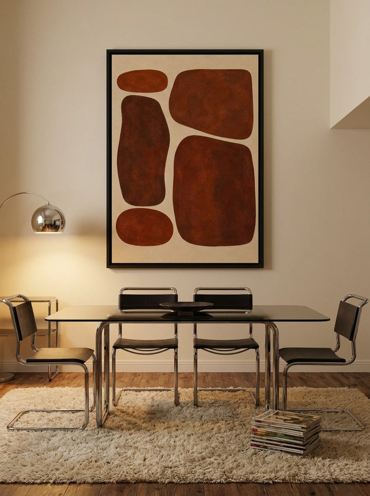 Oversized statement canvas wall art with a black surround styled on the wall in a retro 70s dining room