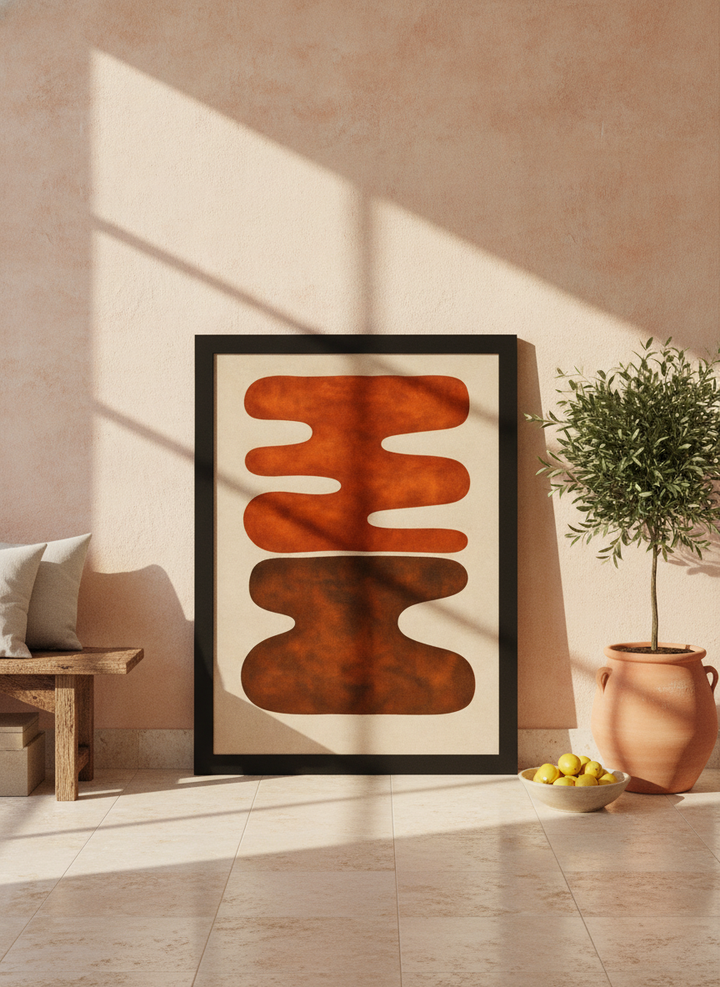Modern wall art print leaning against the wall in a Mediterranean living room