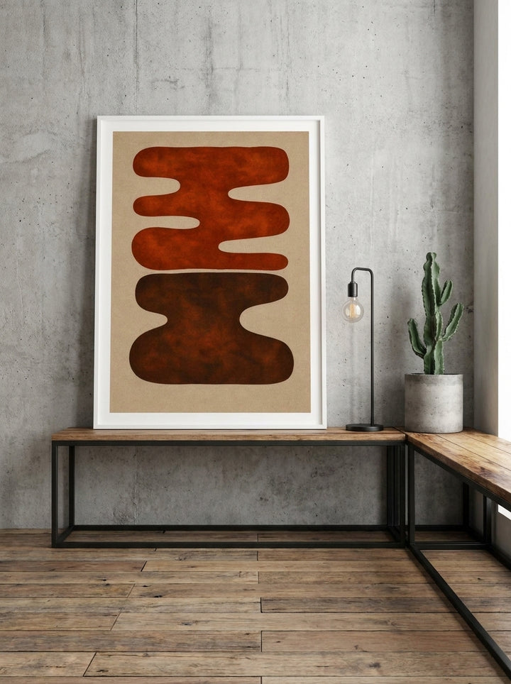 Modern wall art print standing on a console in an industrial loft bedroom