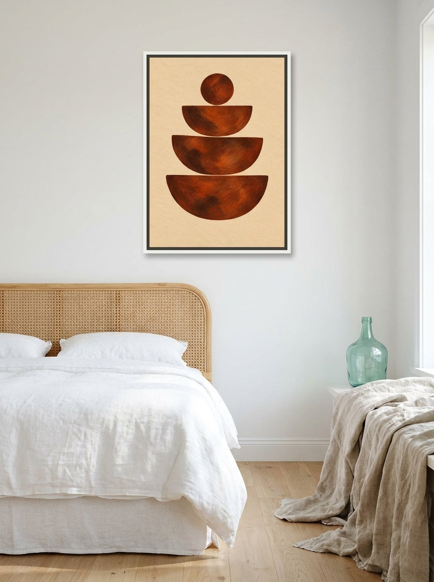 Canvas wall art with a white surround styled on the wall in a coastal bedroom