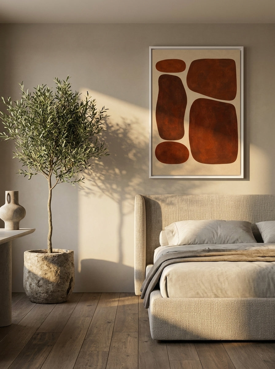 Canvas wall art with a white surround styled on the wall in a luxe bedroom
