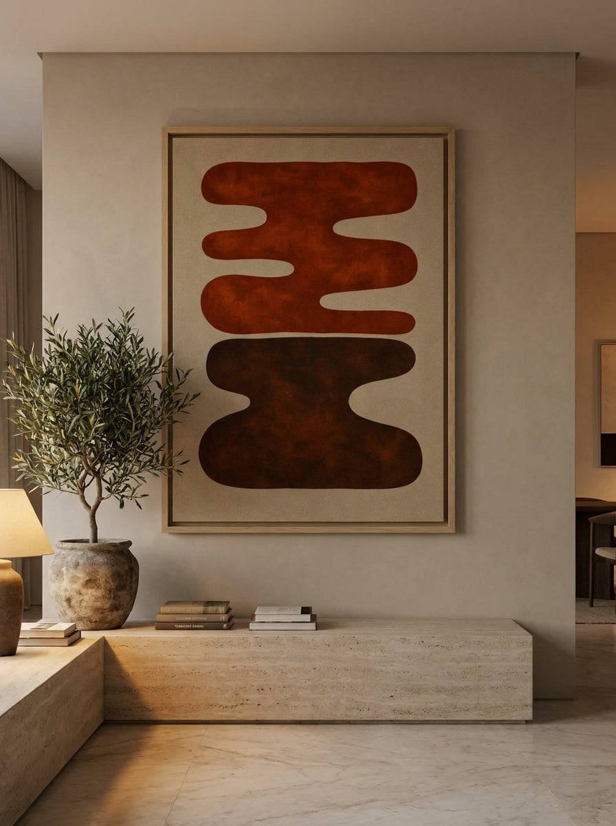 Oversized statement canvas wall art with a natural timber surround styled on the wall in a luxe living room