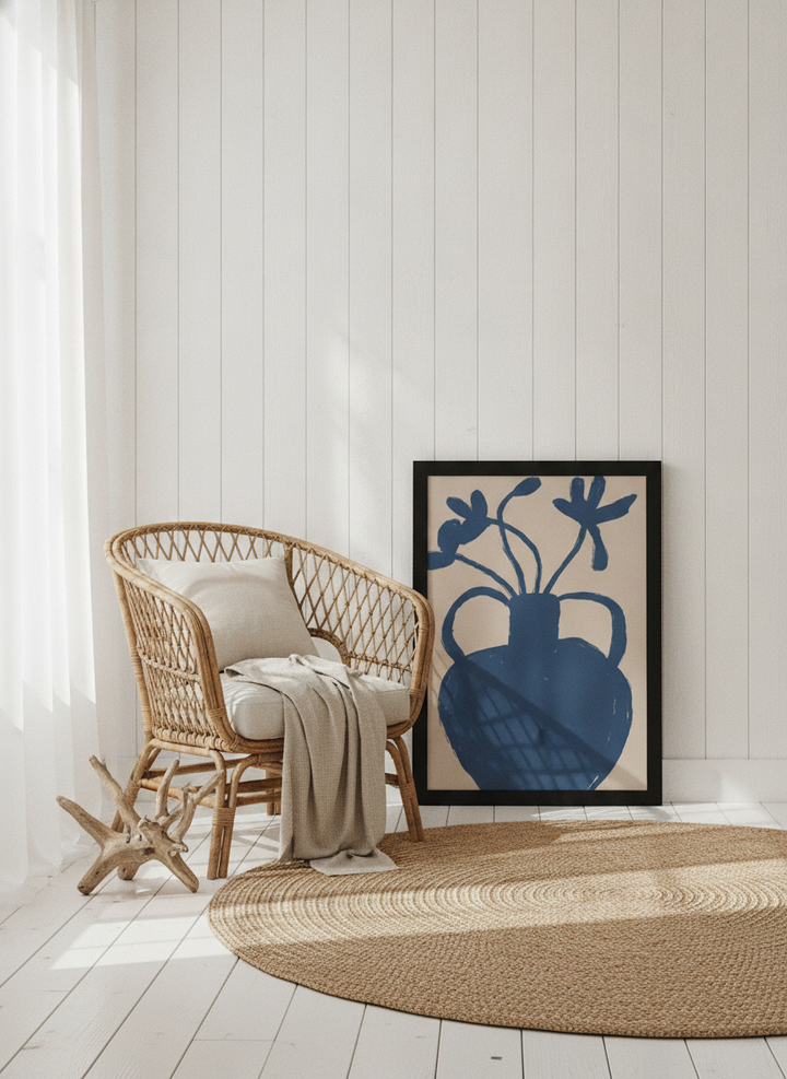 Modern wall art print leaning against the wall in a coastal home office