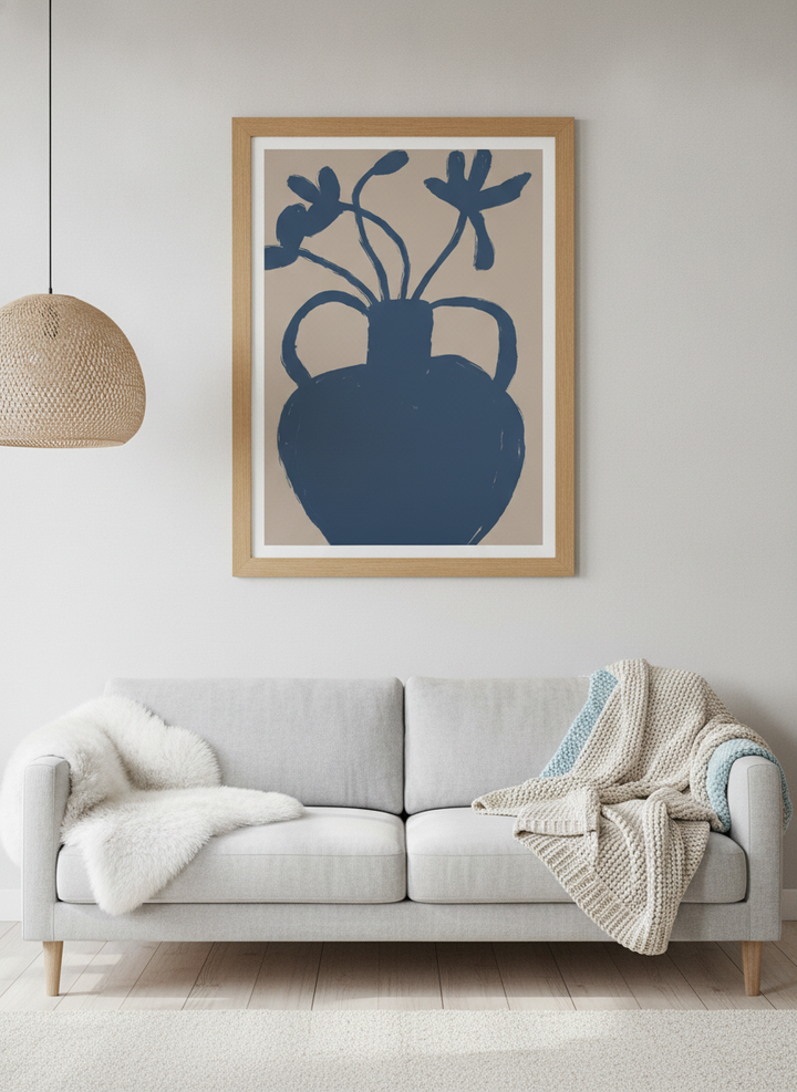 Modern wall art print styled on the wall in a bright Scandinavian living room