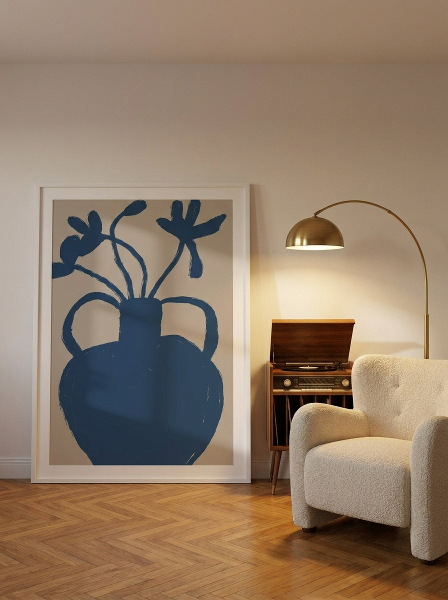 Oversized statement modern wall art print leaning against the wall in a mid-century living room