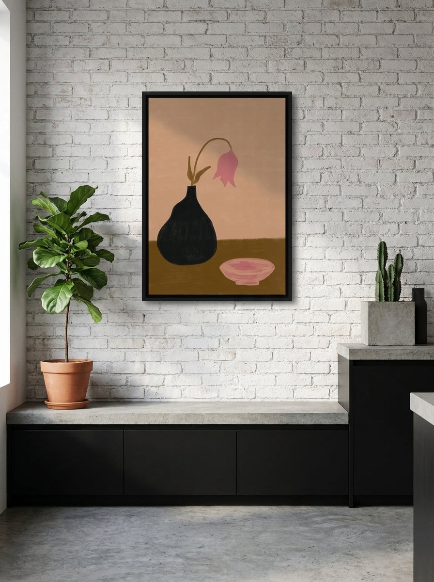 Canvas wall art with a black surround styled on the wall in an industrial loft kitchen